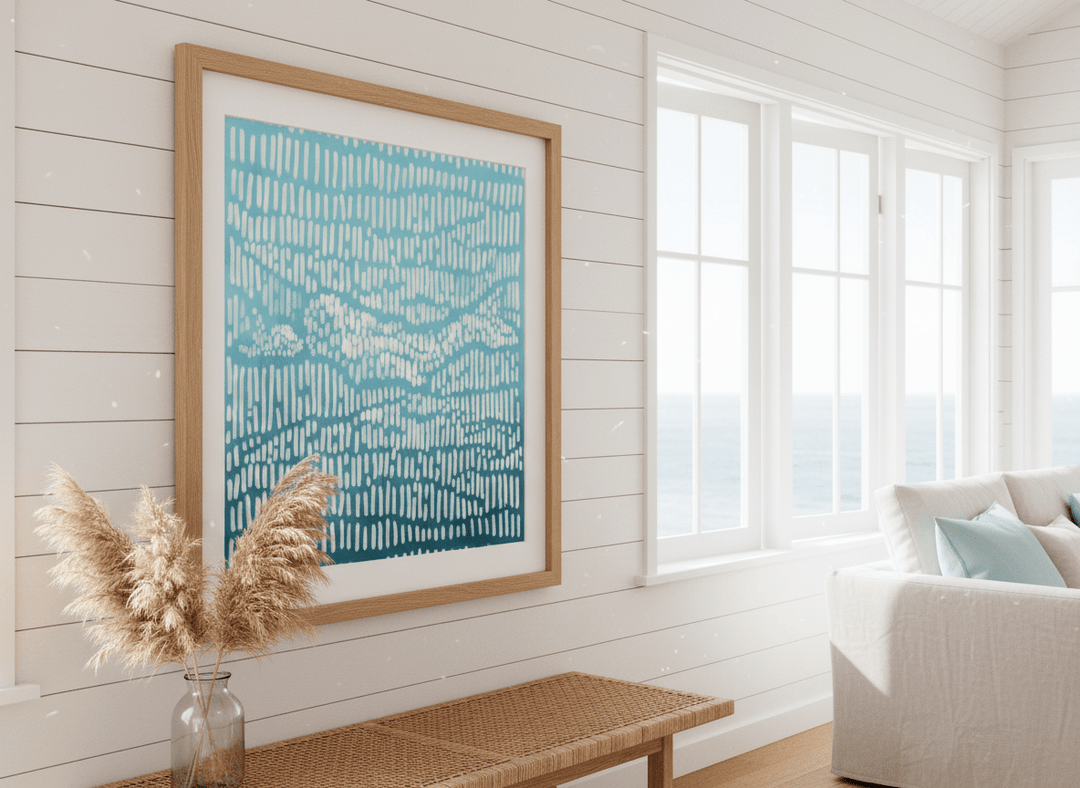 Neutral wall art displayed in a sunny coastal beach house