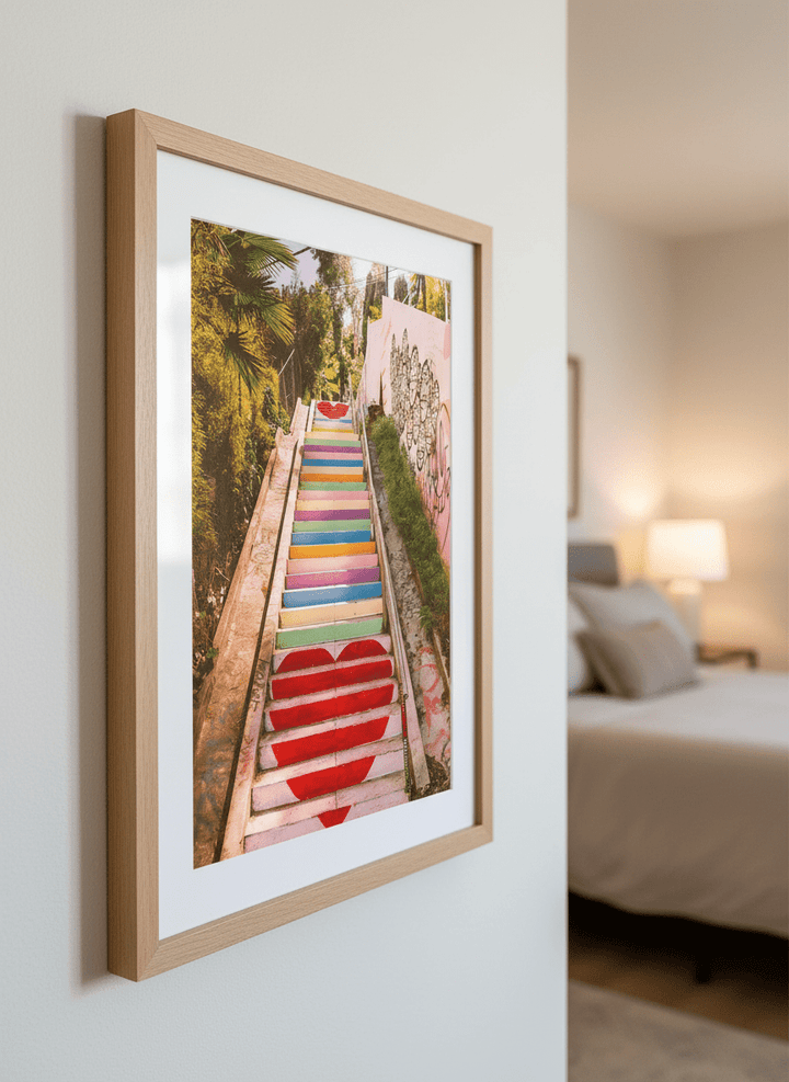Minimalist artwork displayed in a calm, light-filled bedroom interior