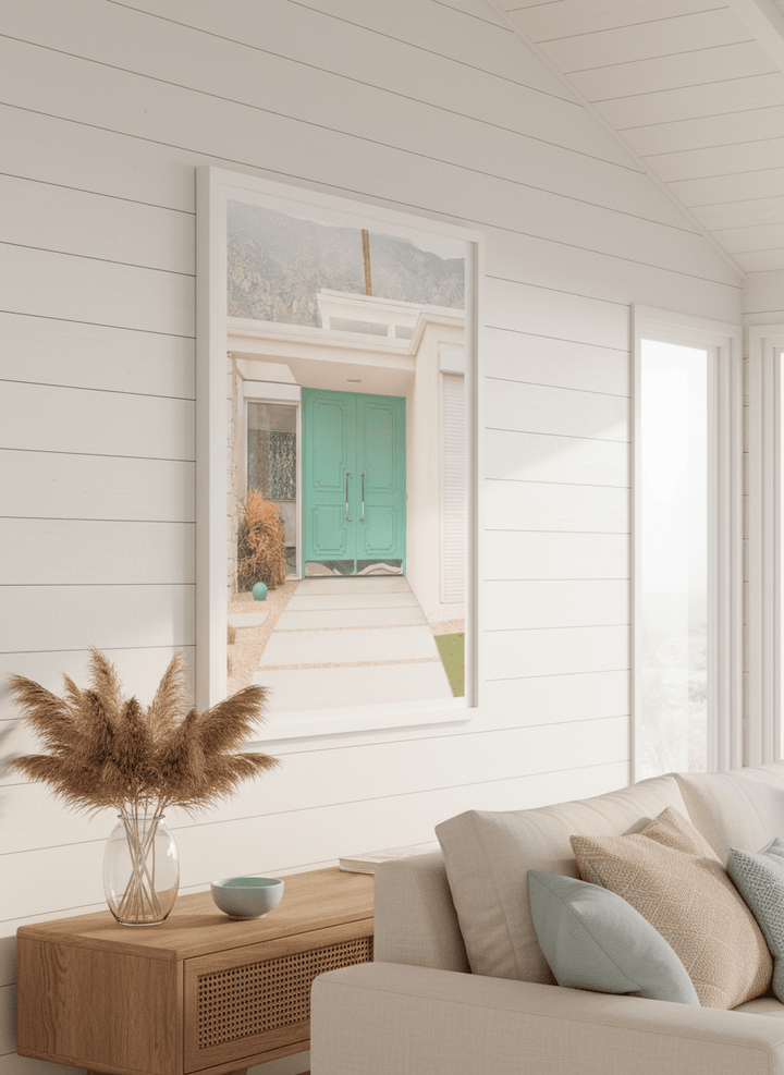 Neutral wall art displayed in a sunny coastal beach house