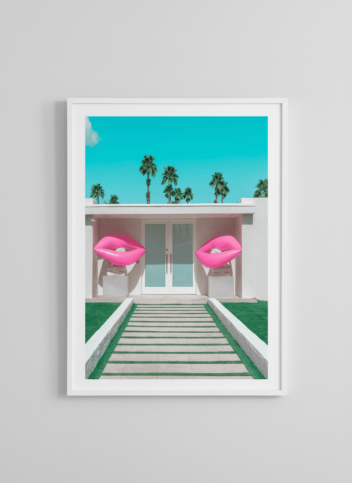 Modern wall art styled above a sofa in a neutral living room