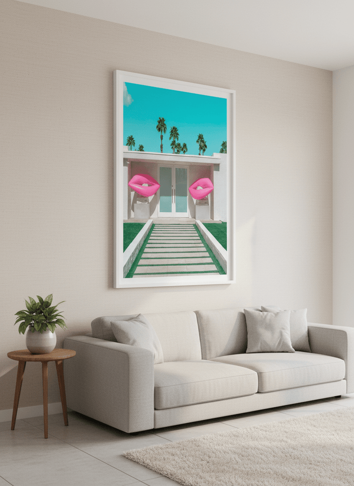 Modern wall art styled above a sofa in a neutral living room