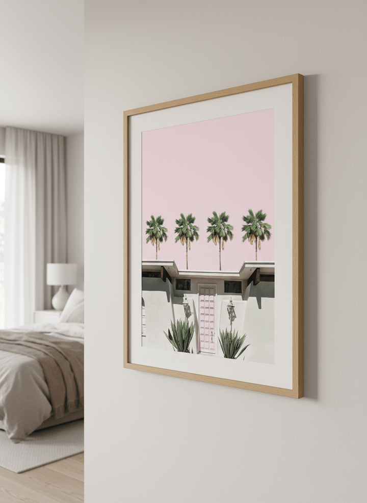 Minimalist artwork displayed in a calm, light-filled bedroom interior