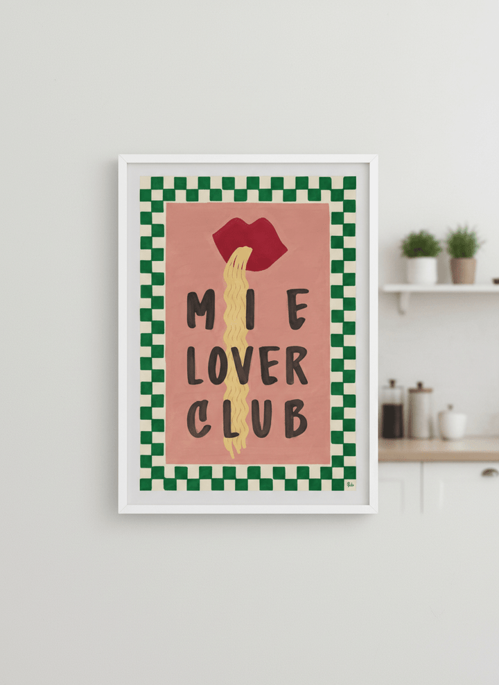 Artwork styled on the wall of a bright modern kitchen