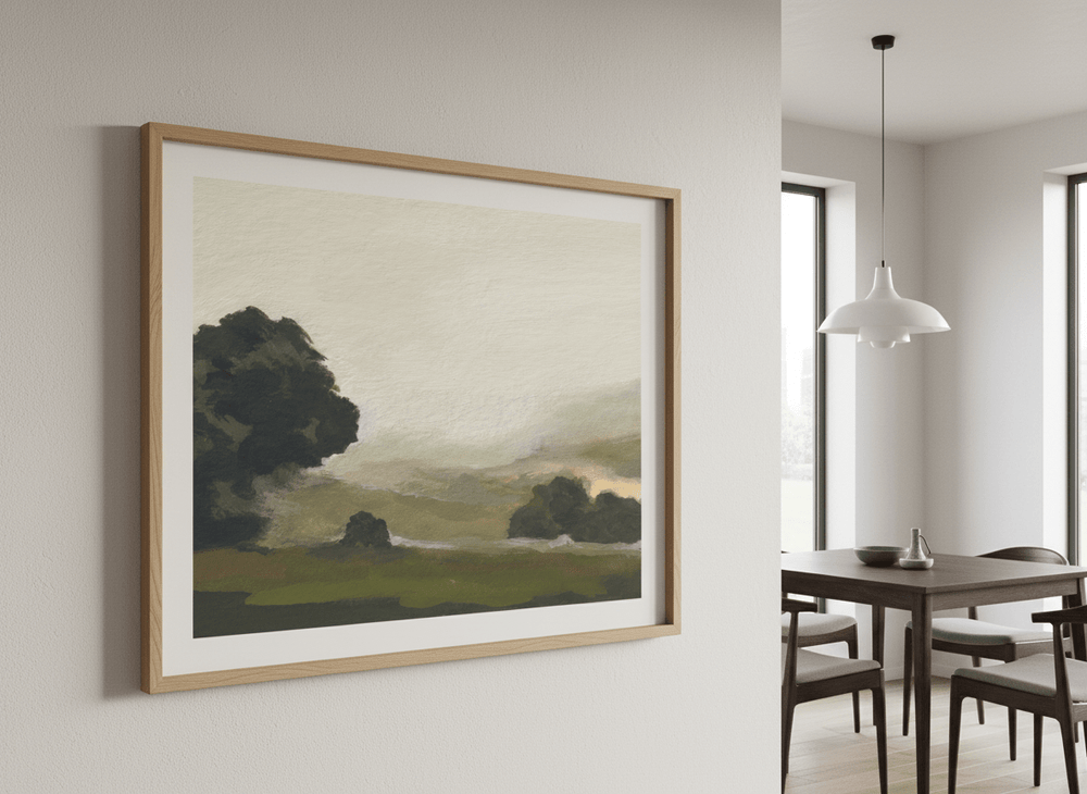 Wall art styled above a dining table in a contemporary home