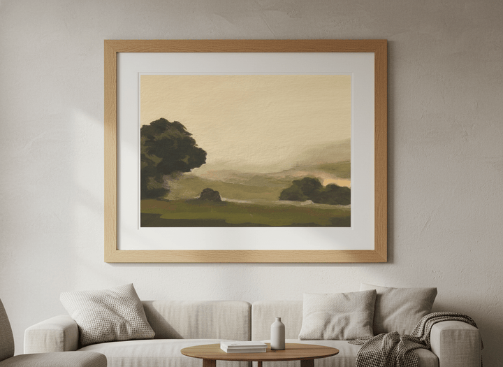 Modern wall art styled above a sofa in a neutral living room
