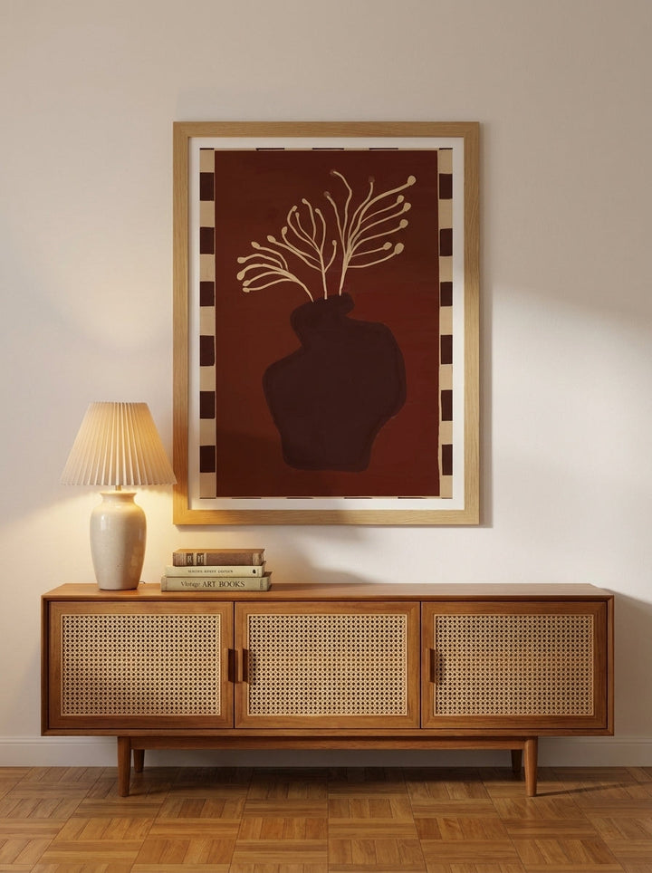 Modern wall art print styled on the wall in a mid-century living room