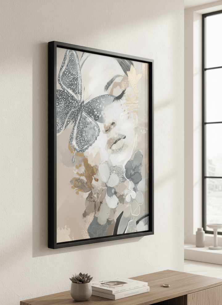 Modern wall art styled above a sofa in a neutral living room