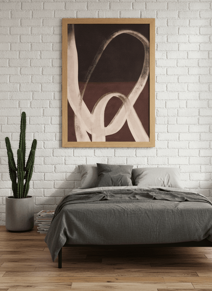 Modern wall art print styled on the wall in an industrial loft bedroom