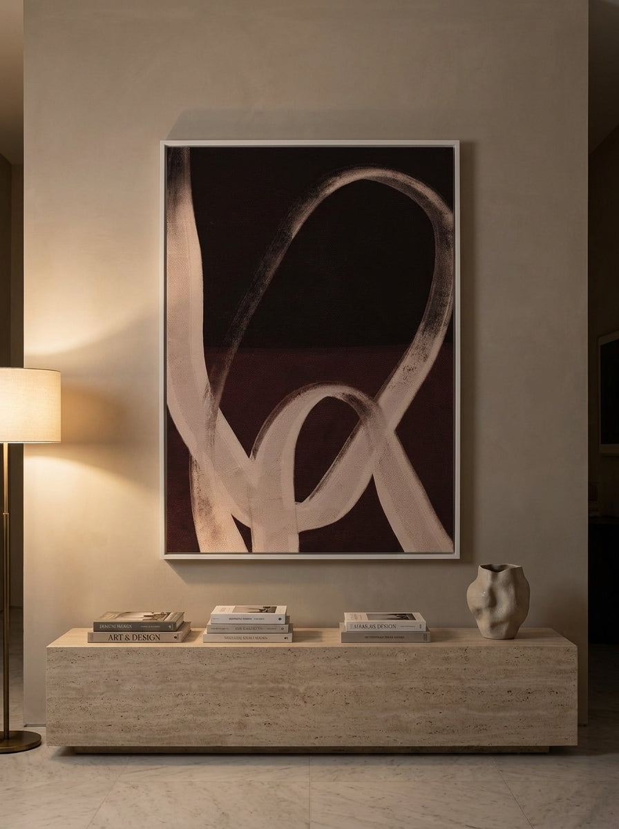 Oversized statement modern wall art print styled on the wall in a luxe living room