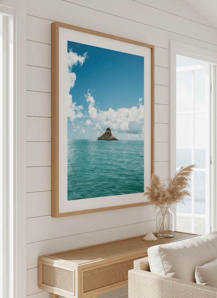 Neutral wall art displayed in a sunny coastal beach house