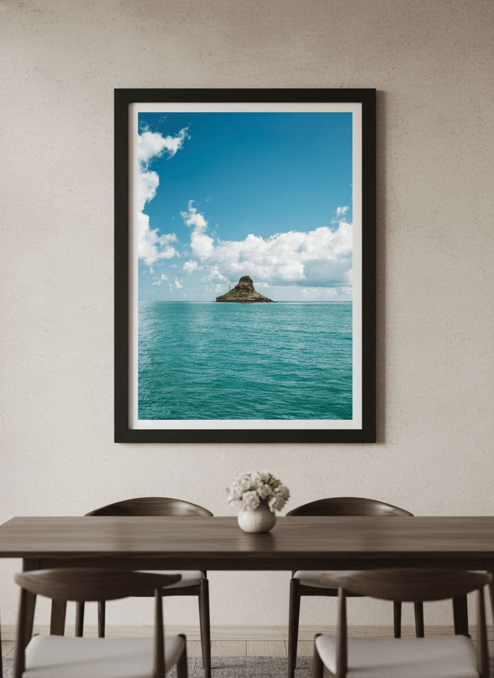 Wall art styled above a dining table in a contemporary home
