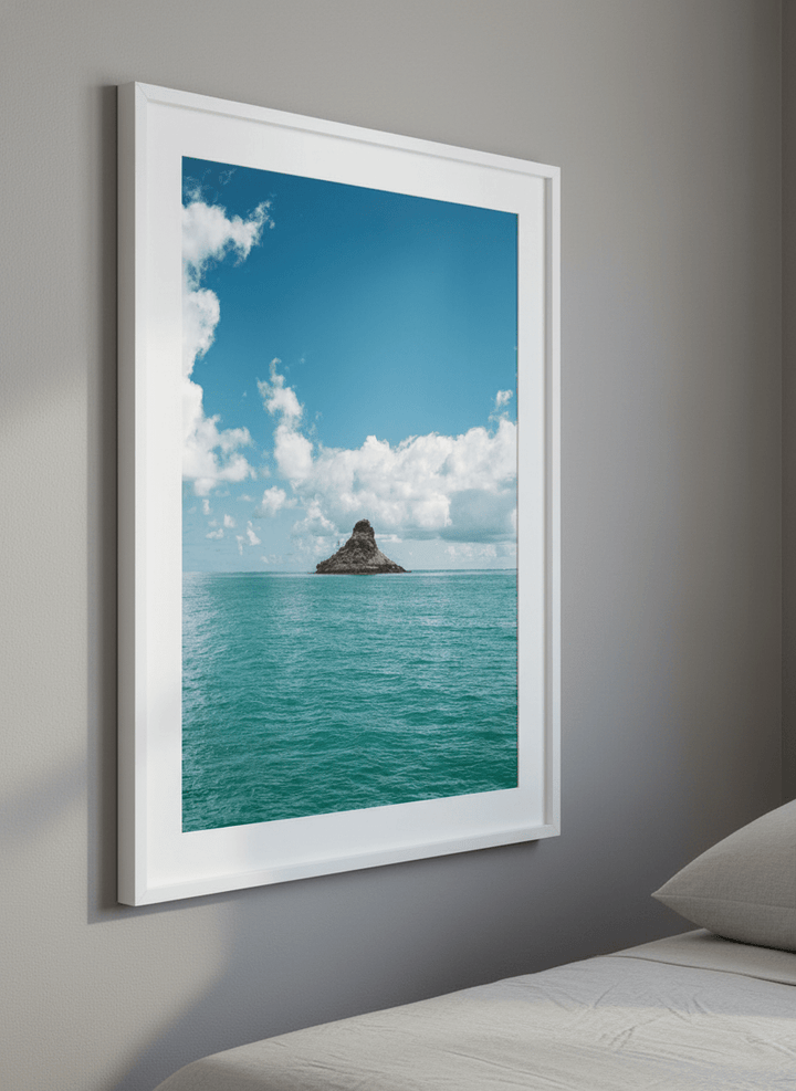 Minimalist artwork displayed in a calm, light-filled bedroom interior
