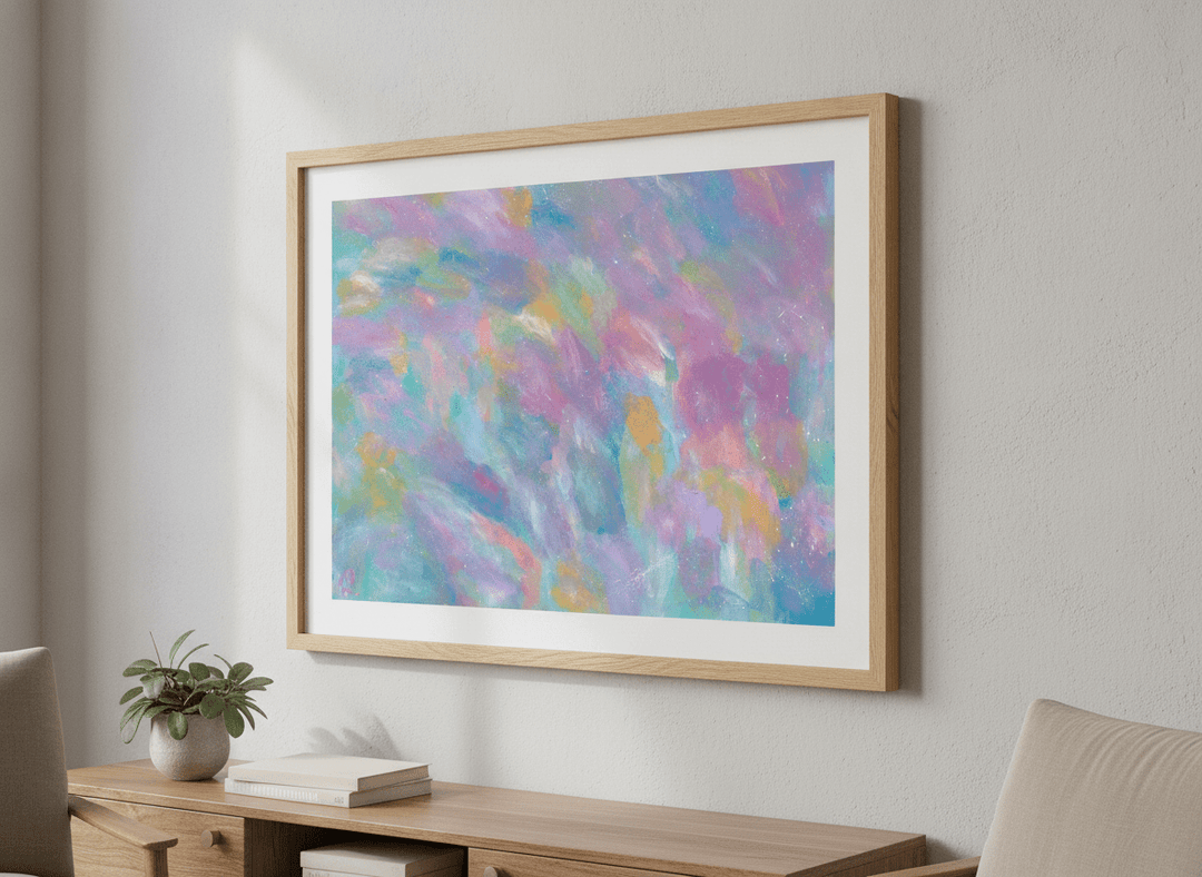 Modern wall art styled above a sofa in a neutral living room