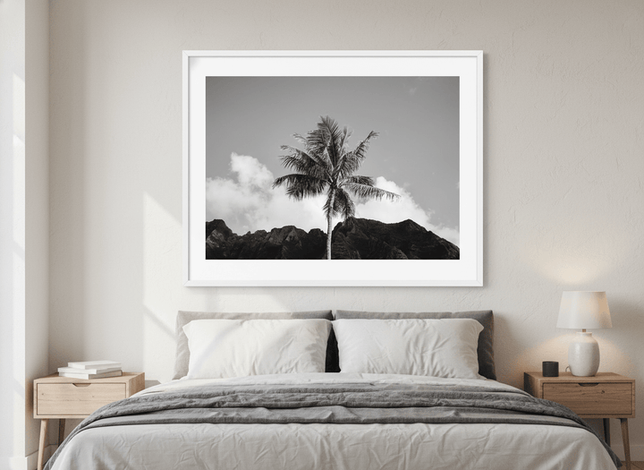 Minimalist artwork displayed in a calm, light-filled bedroom interior