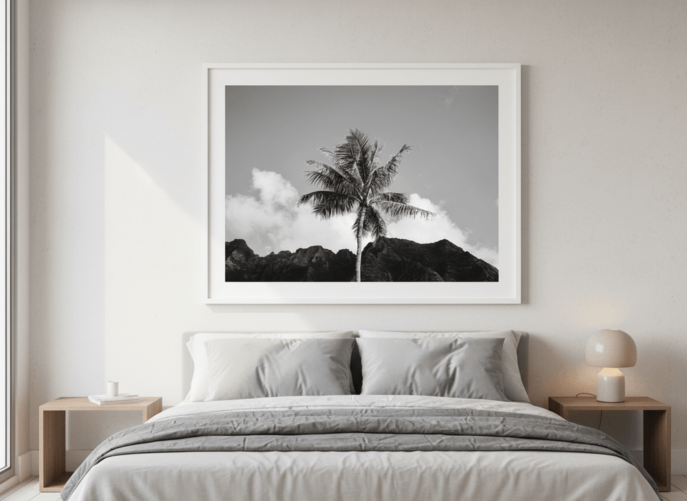 Minimalist artwork displayed in a calm, light-filled bedroom interior