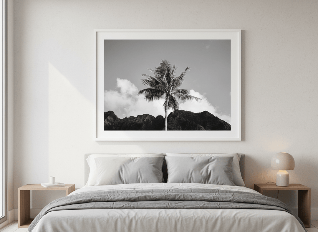 Minimalist artwork displayed in a calm, light-filled bedroom interior