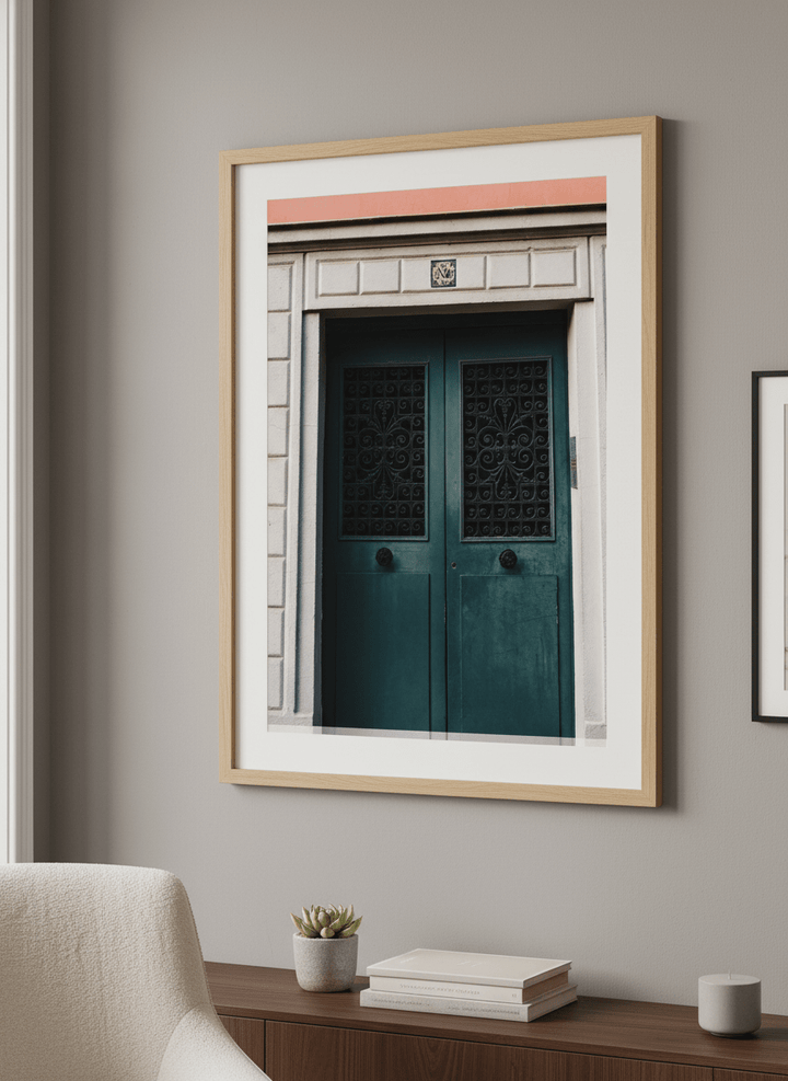 Modern wall art styled above a sofa in a neutral living room