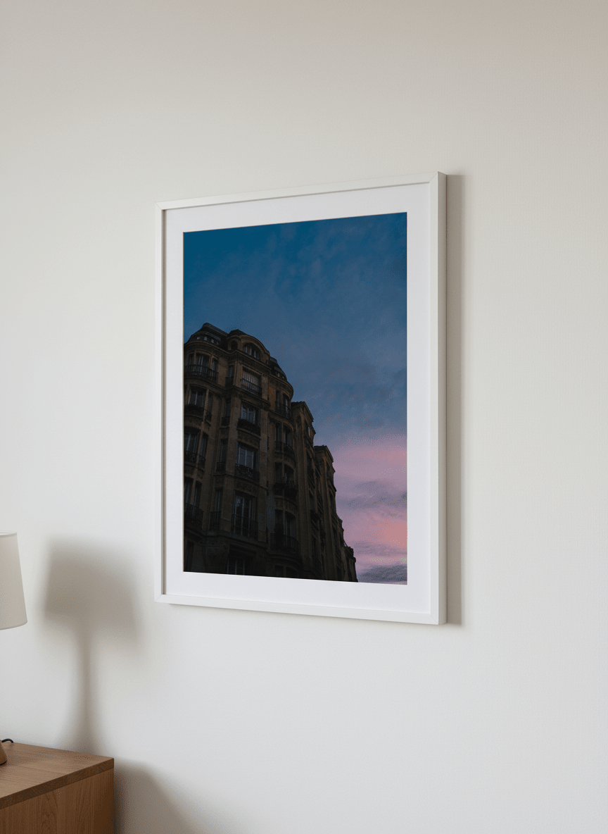 Minimalist artwork displayed in a calm, light-filled bedroom interior
