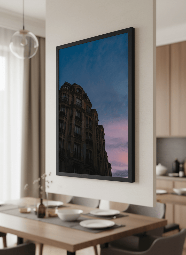Wall art styled above a dining table in a contemporary home