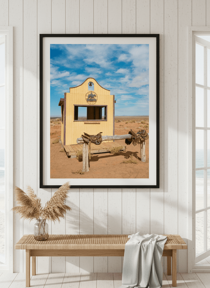 Neutral wall art displayed in a sunny coastal beach house