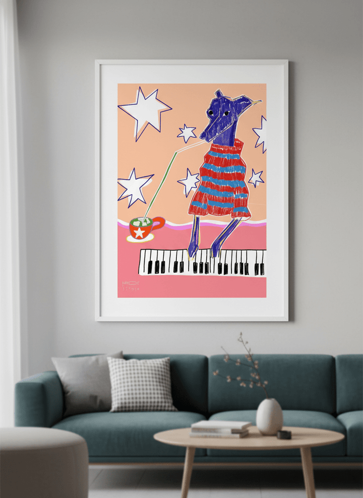 Modern wall art styled above a sofa in a neutral living room