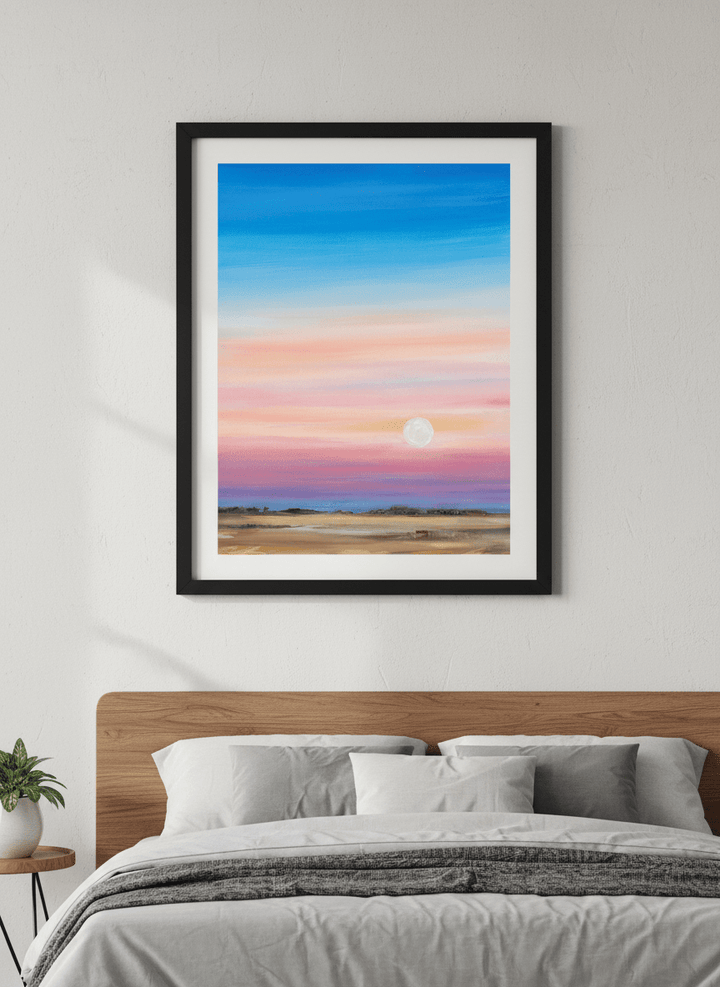 Minimalist artwork displayed in a calm, light-filled bedroom interior