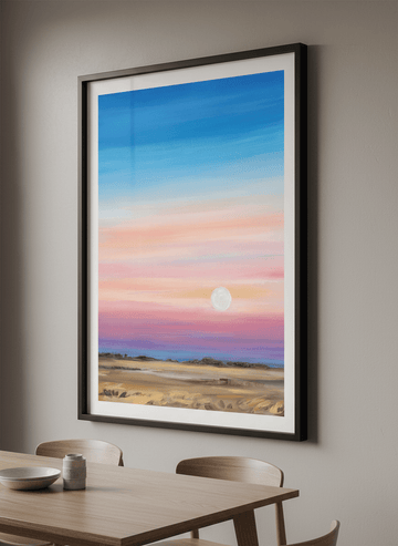 Wall art styled above a dining table in a contemporary home