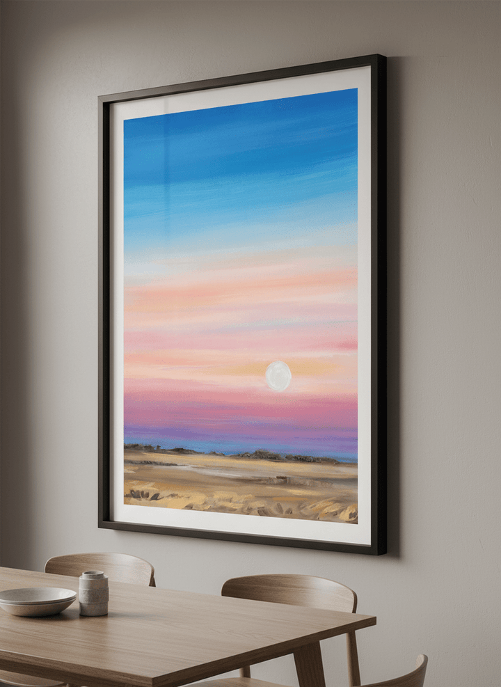 Wall art styled above a dining table in a contemporary home