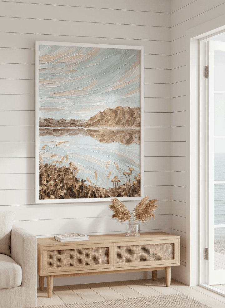 Neutral wall art displayed in a sunny coastal beach house