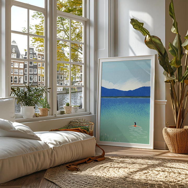 Living room with large window, indoor plants, and a picture of a lake.