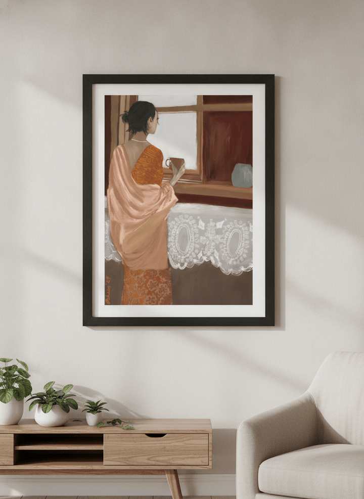 Modern wall art styled above a sofa in a neutral living room