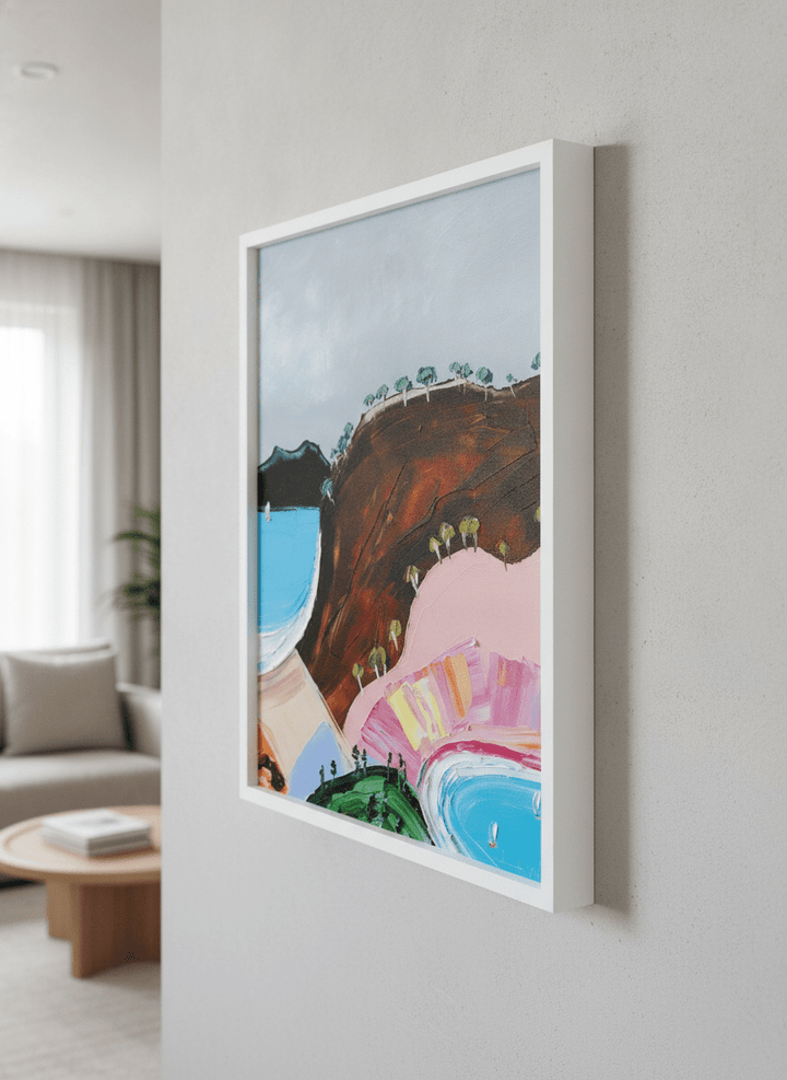 Modern wall art styled above a sofa in a neutral living room