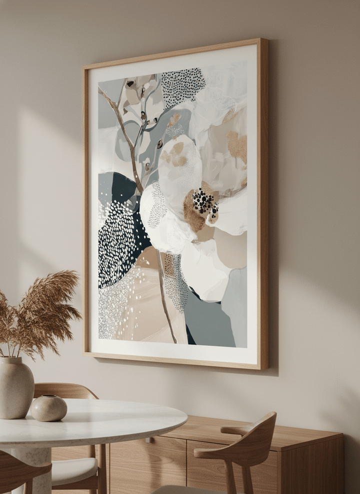 Wall art styled above a dining table in a contemporary home