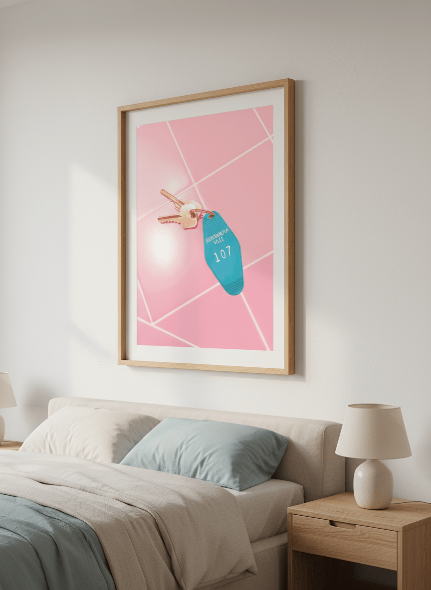 Minimalist artwork displayed in a calm, light-filled bedroom interior