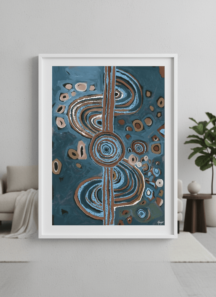 Modern wall art styled above a sofa in a neutral living room