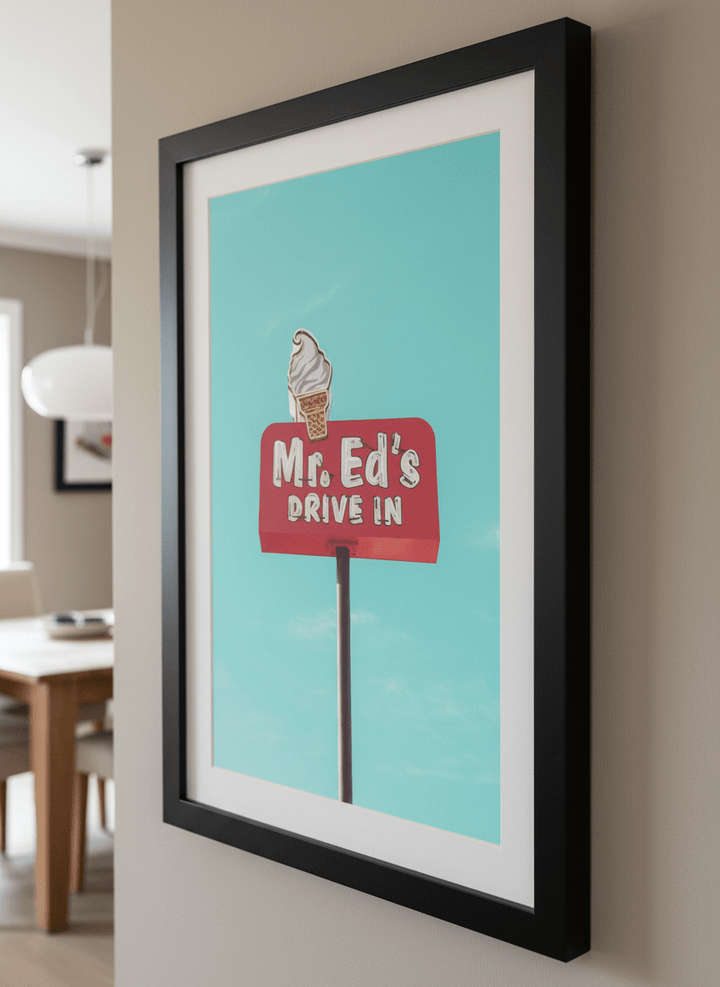 Wall art styled above a dining table in a contemporary home