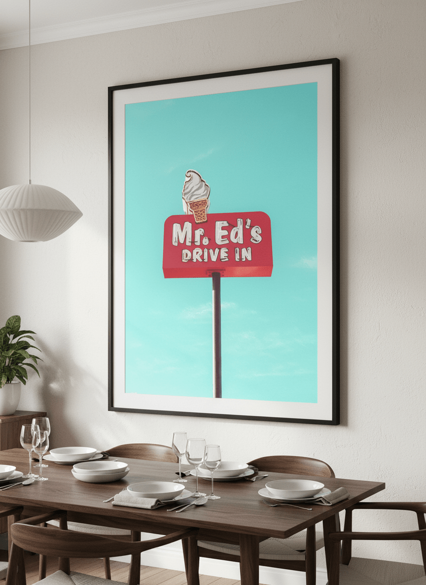 Wall art styled above a dining table in a contemporary home