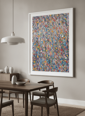 Wall art styled above a dining table in a contemporary home