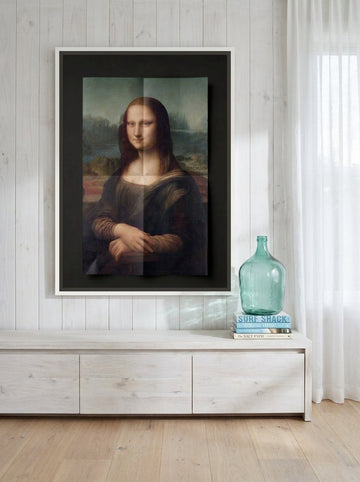 Canvas wall art with a white surround styled on the wall in a coastal living room