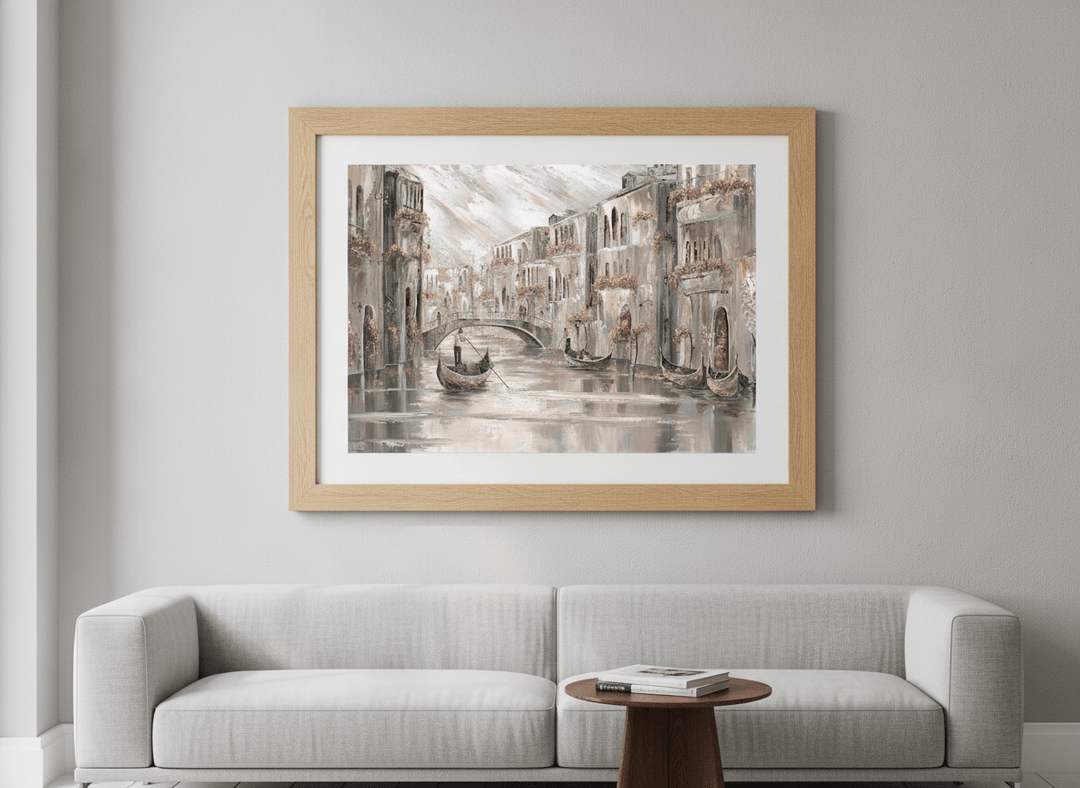 Modern wall art styled above a sofa in a neutral living room