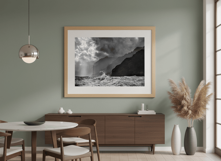 Wall art styled above a dining table in a contemporary home