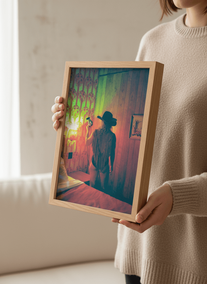 Person showcasing the artwork against a clean modern interior wall