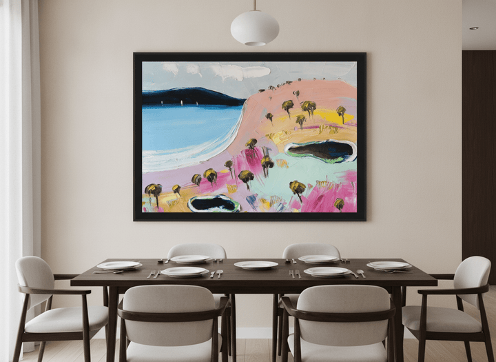 Wall art styled above a dining table in a contemporary home