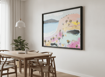 Wall art styled above a dining table in a contemporary home