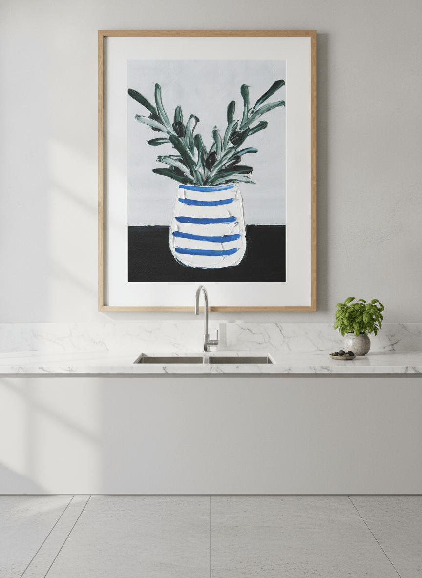 Artwork styled on the wall of a bright modern kitchen