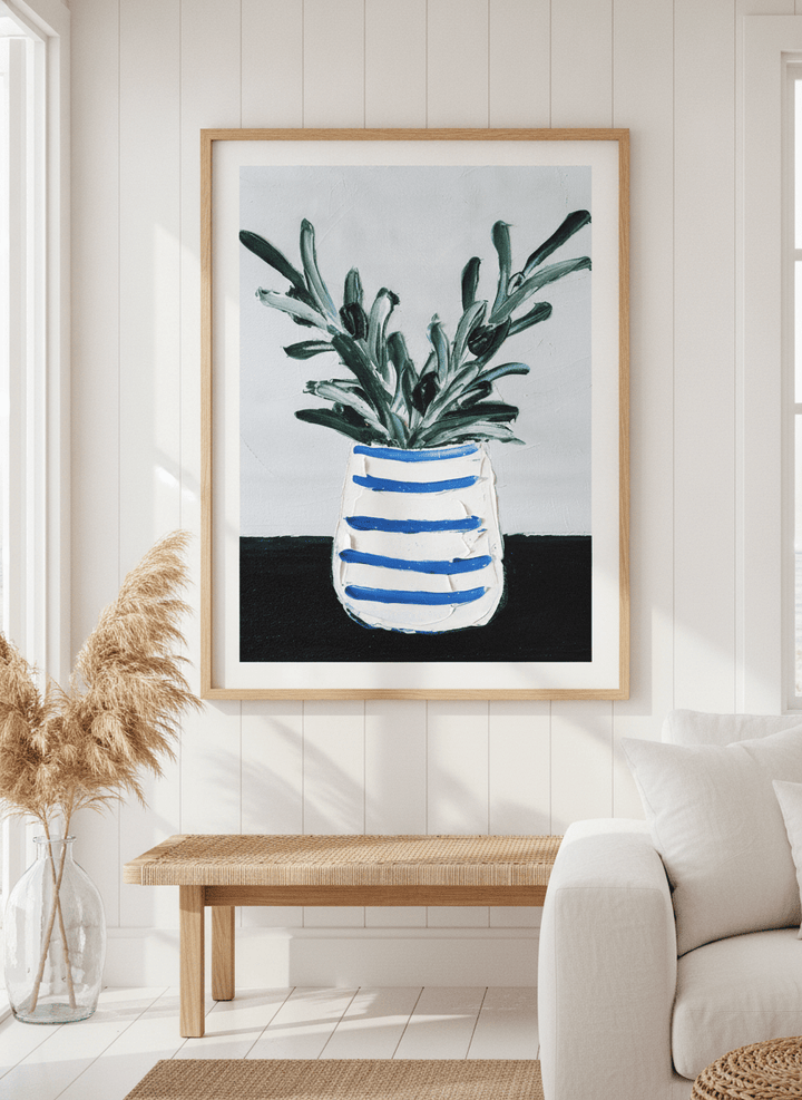 Neutral wall art displayed in a sunny coastal beach house