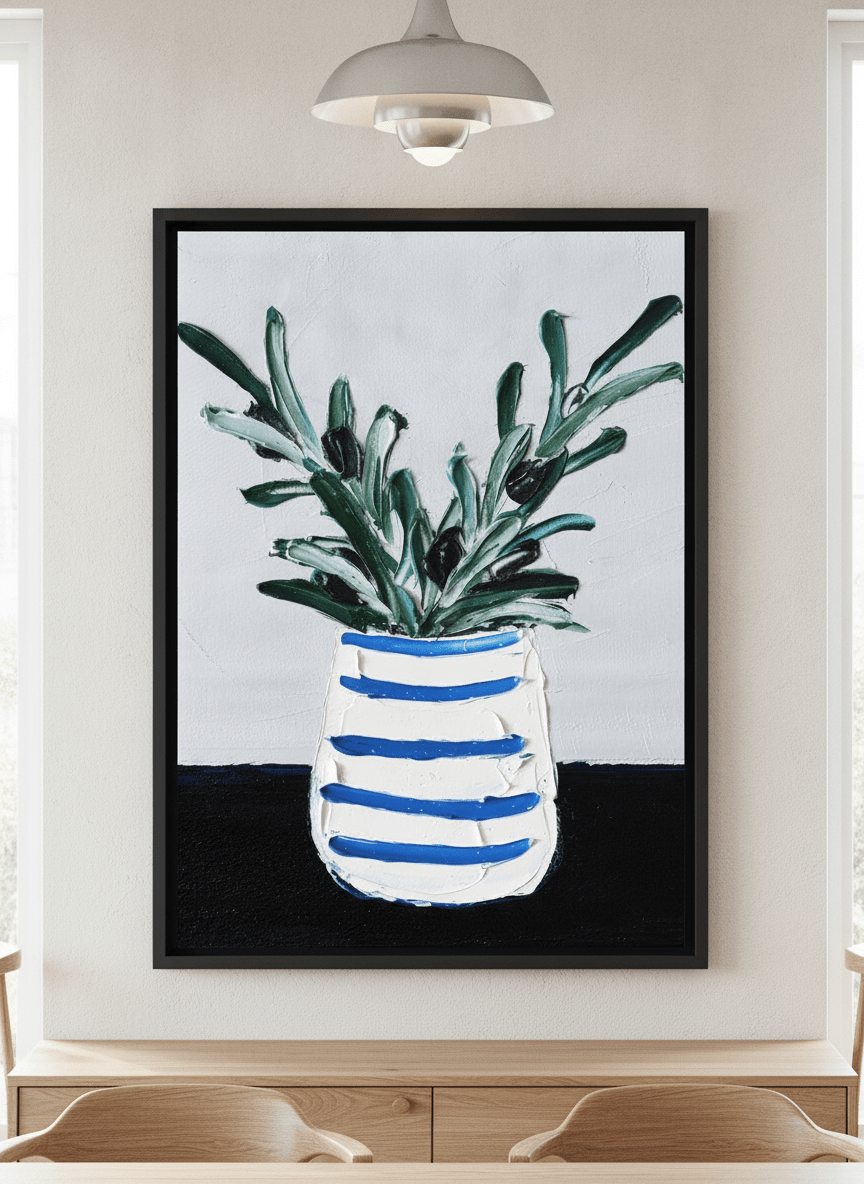 Wall art styled above a dining table in a contemporary home