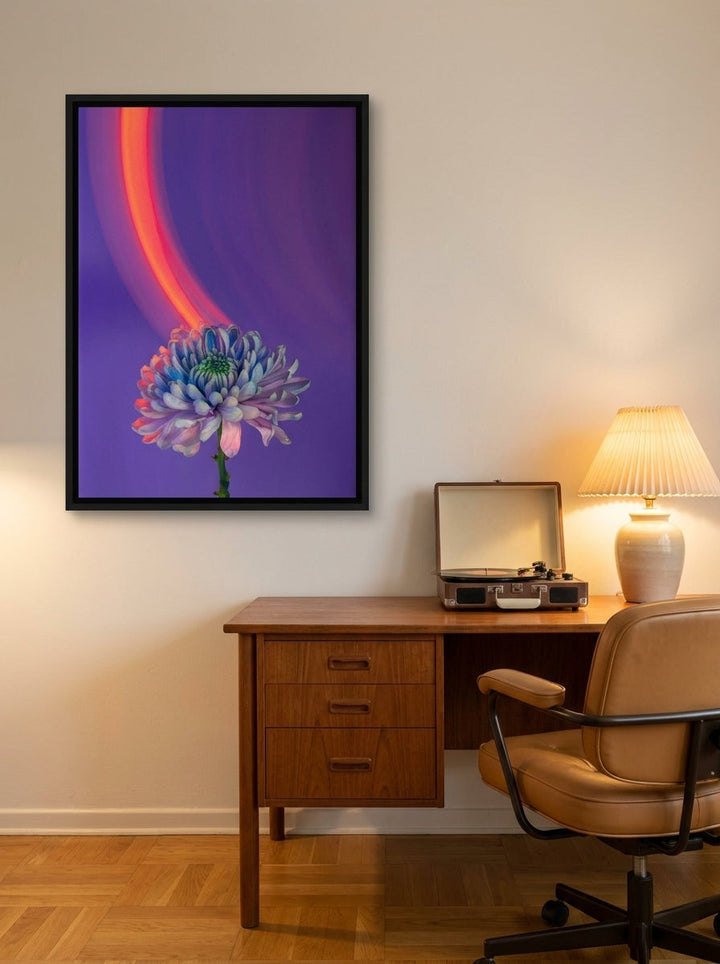 Canvas wall art with a black surround styled on the wall in a mid-century home office