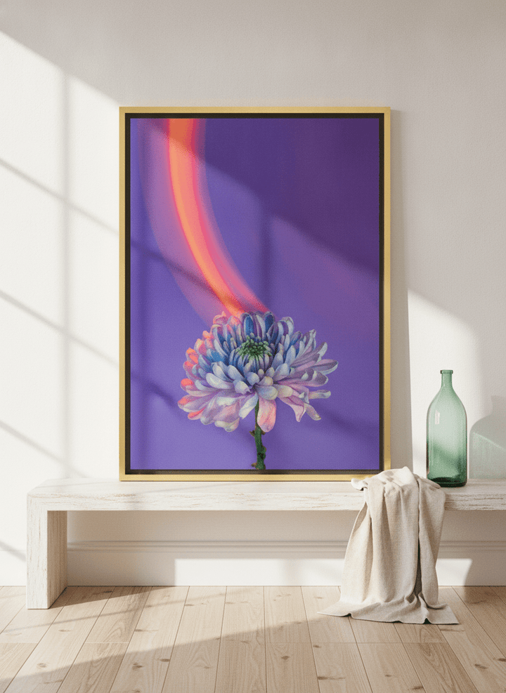 Canvas wall art with a gold leaf surround standing on a console in a coastal living room