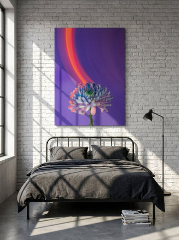 Stretched canvas wall art styled on the wall in an industrial loft bedroom
